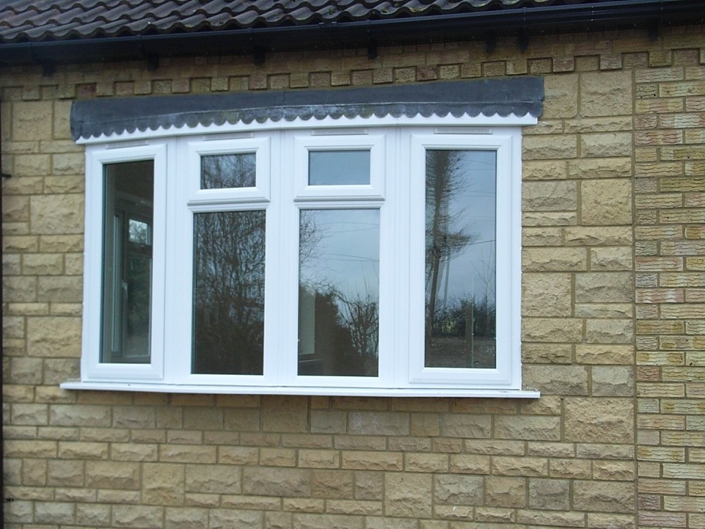 a white upvc bow window