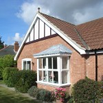 white bay window on property