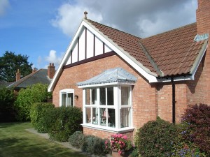 white bay window on property