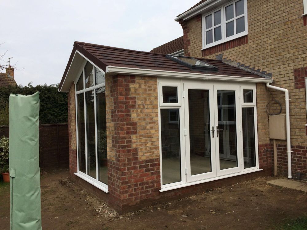 tiled conservatory roof on extension on side of house